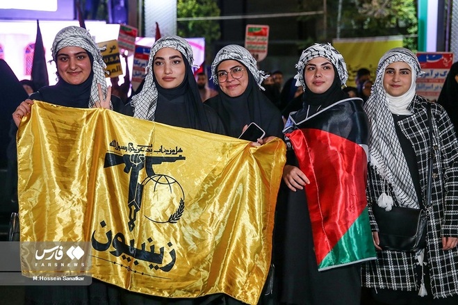 تصاویری از تجمع شبانه برگزار شده در میدان فلسطین تهران را ببینید