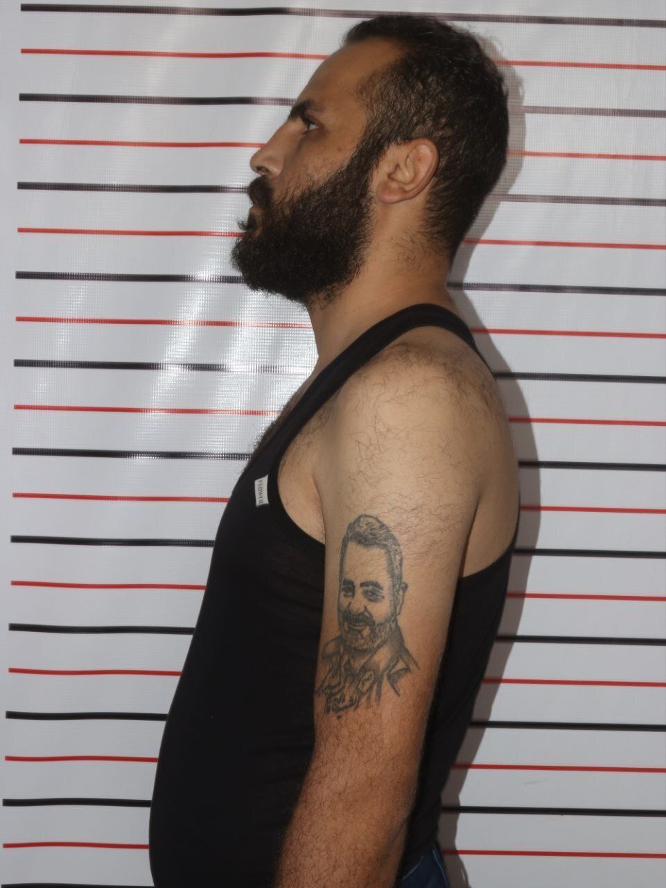 رونمایی از خالکوبی عکس سردار سلیمانی روی دست مقام نظام بشار اسد | او بازداشت شد