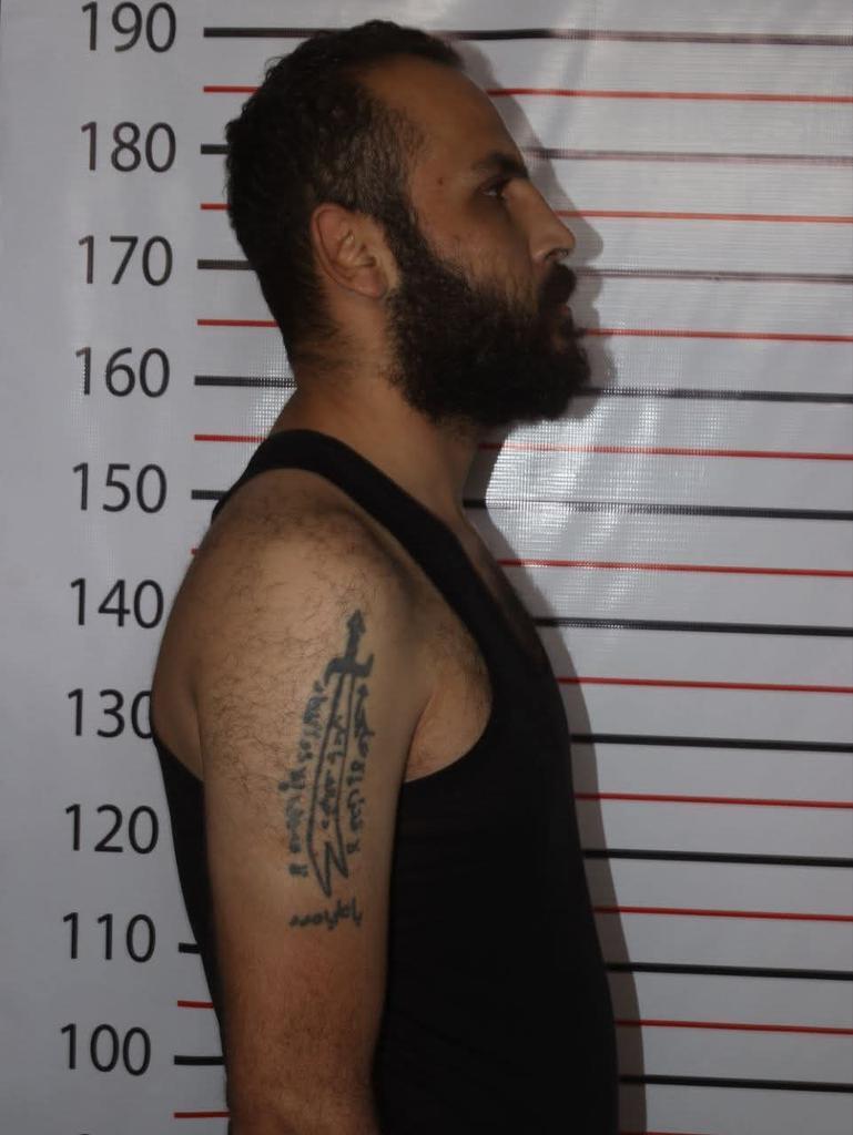 رونمایی از خالکوبی عکس سردار سلیمانی روی دست مقام نظام بشار اسد | او بازداشت شد